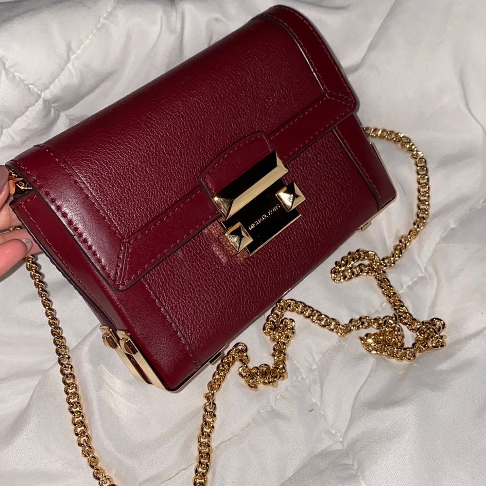Michael Kors Trunk crossbody bag that can also be turned into a clutch!